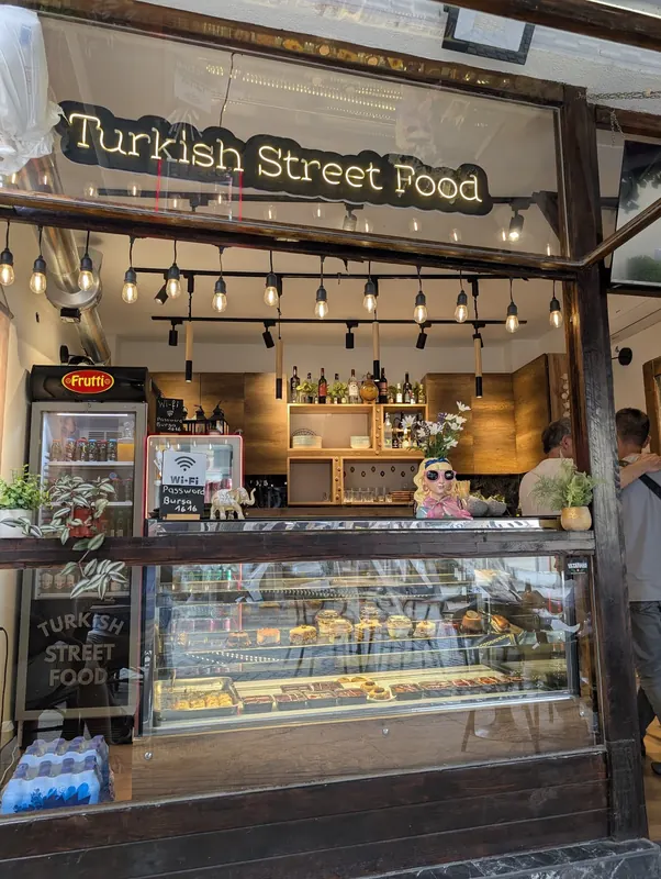 The Turkish Street Food counter with its glowing sign