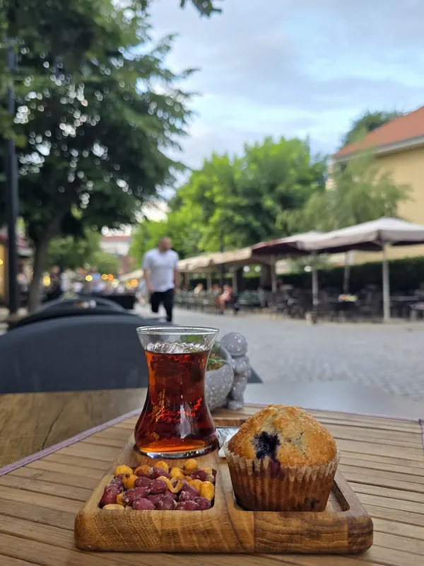 Tea and a blueberry muffin on the terrace